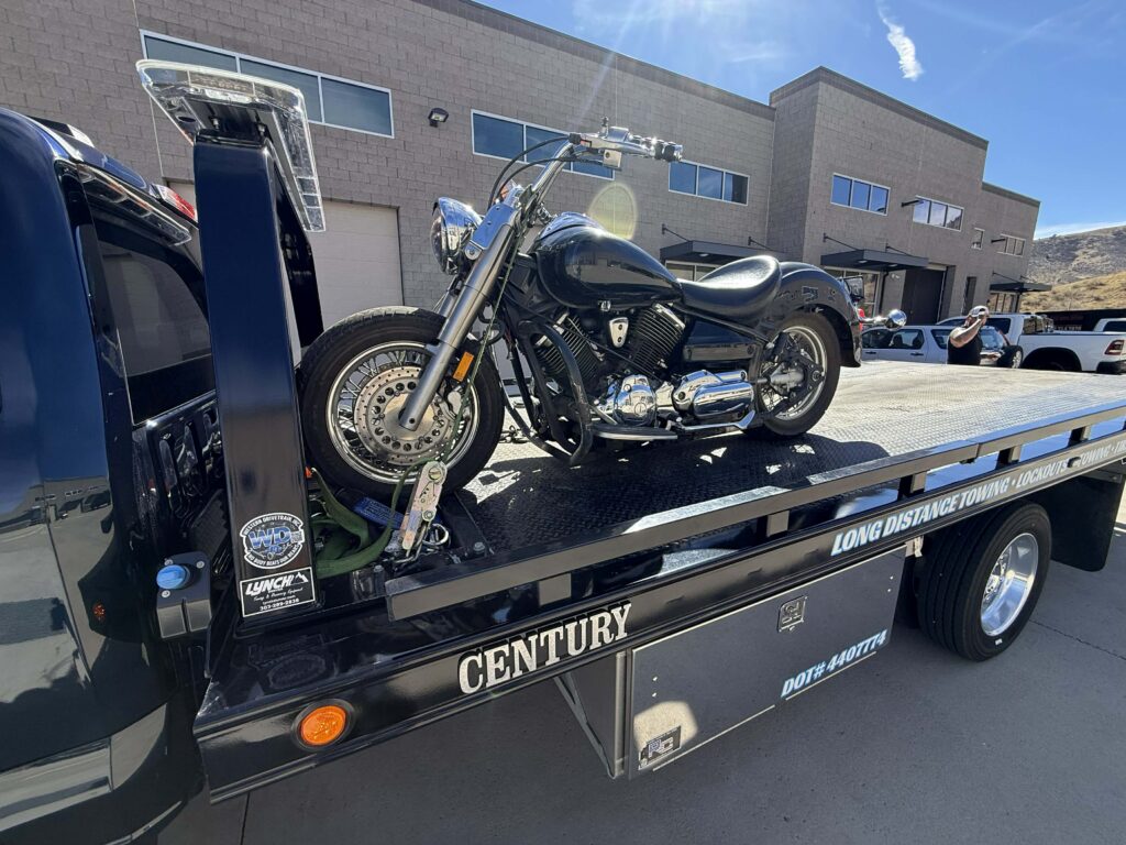 Motorcycle secured on a First Response Towing flatbed
